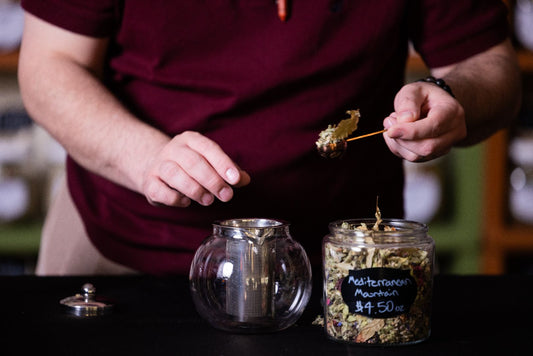 Gentleman Pouring Tea In to Tea Pot