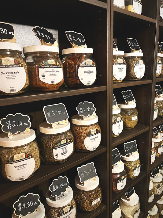 Assorted Herbs in jars on a shelves